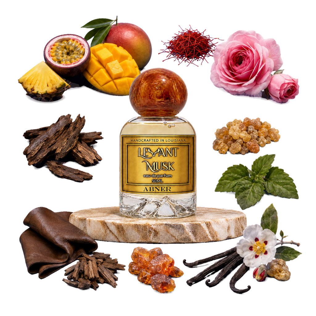 A perfume bottle labeled ABMER eau de parfum by Levant Musk centered on a light wood pedestal, surrounded by illustrated or photographed scent ingredients including pink roses, mango, passion fruit, saffron threads, vanilla beans, brown leather pieces, amber resin, mint leaves, and dried bark on a white background.