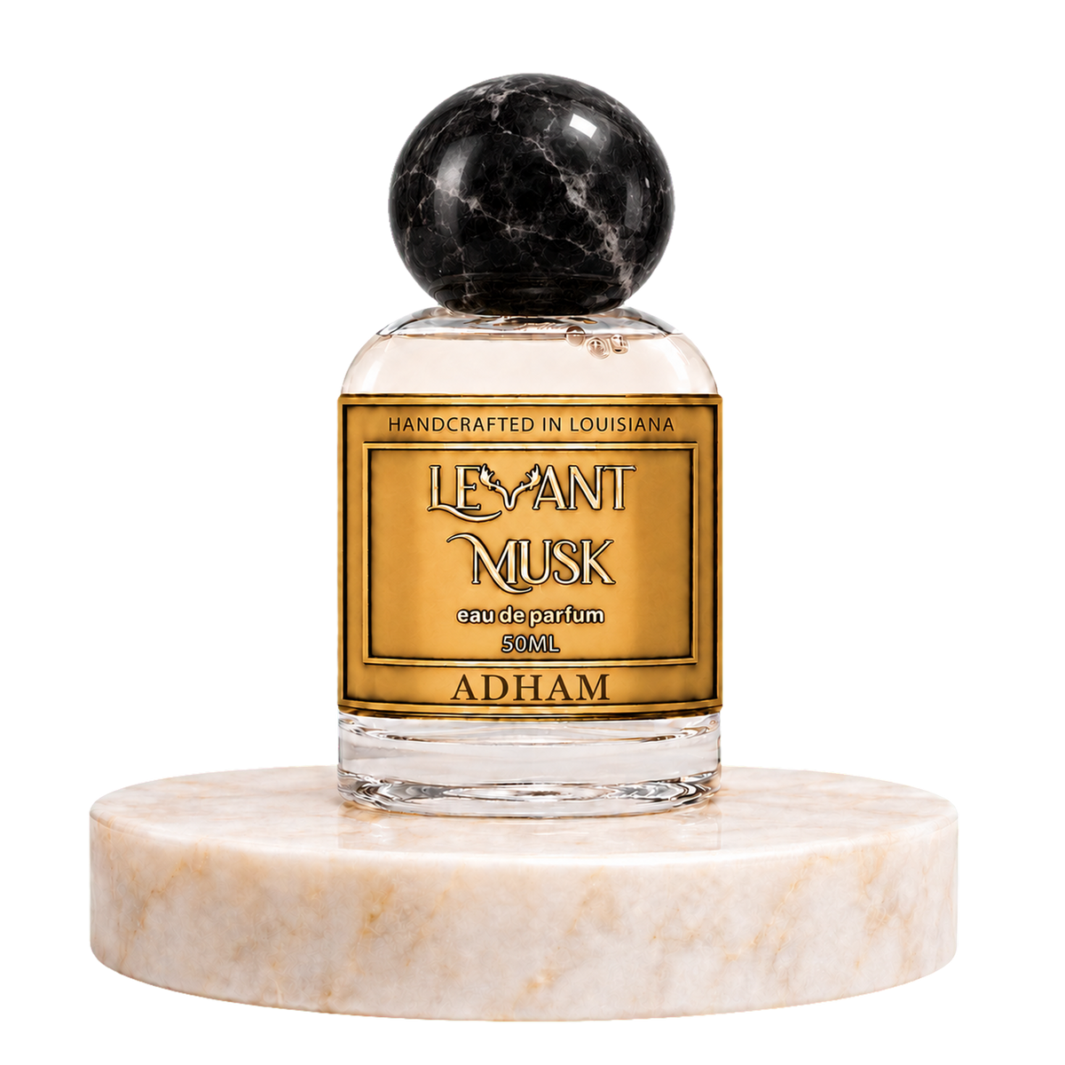 ADHAM 50 mL eau de parfum by Levant Musk, with a black marble-patterned round cap, on a marble pedestal.