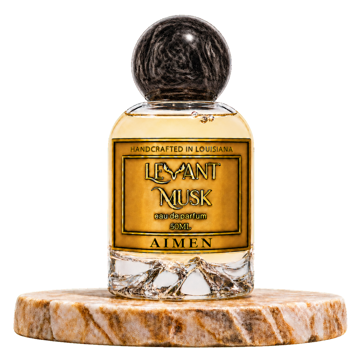 AIMEN by Levant Musk, 50 mL eau de parfum in a round glass bottle with black cap on a marble stand, transparent background