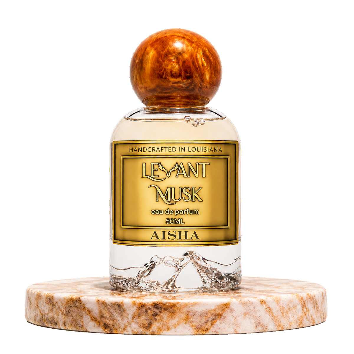 A 50ml bottle of Aisha by 'Levant Musk' eau de parfum, featuring a clear glass body with a gold label and a round, polished brown wooden cap, displayed on a marble pedestal against a white background.