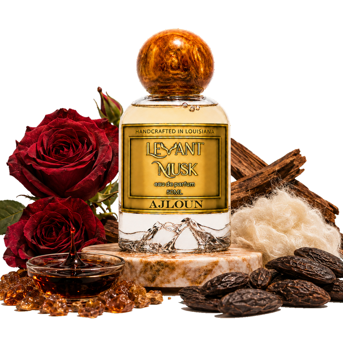 A bottle of AJLOUN eau de parfum by Levant Musk centered on a white background, surrounded by decorative ingredients including red roses, amber honey, dates, wood bark, and white wool. The bottle has a gold label and a metallic gold cap.