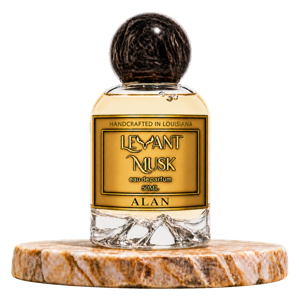 A 50ml bottle of ALAN by 'Levant Musk' handcrafted perfume by the brand  featuring a gold label and a dark, textured spherical cap, displayed on a round brown marble coaster against a white background.