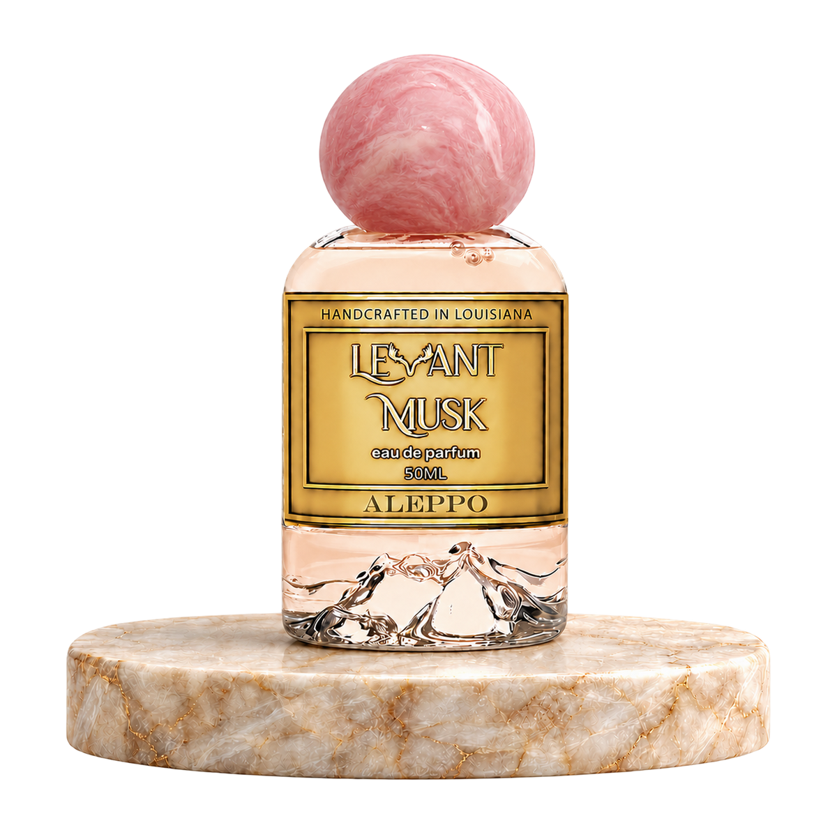A perfume bottle labeled ALEPPO 'Levant Musk' with a pink marble-like spherical cap, set on a round beige marble pedestal against a white background.
