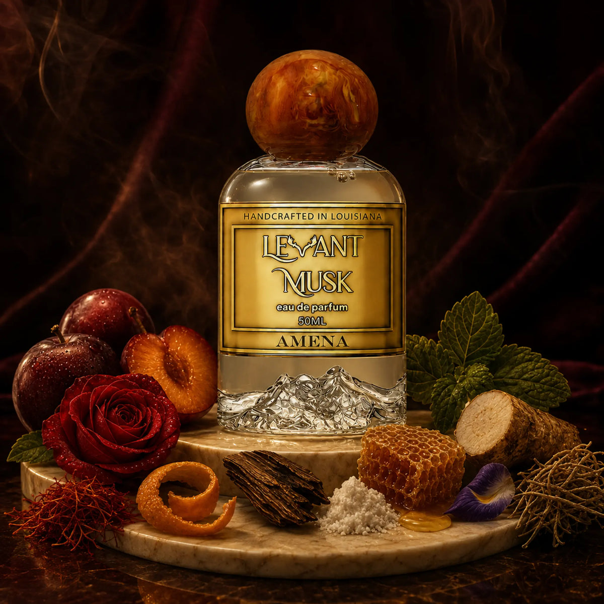 50ml Bottle of AMENA eau de parfum by Levant Musk Monroe, LA, surrounded by the notes of the parfum