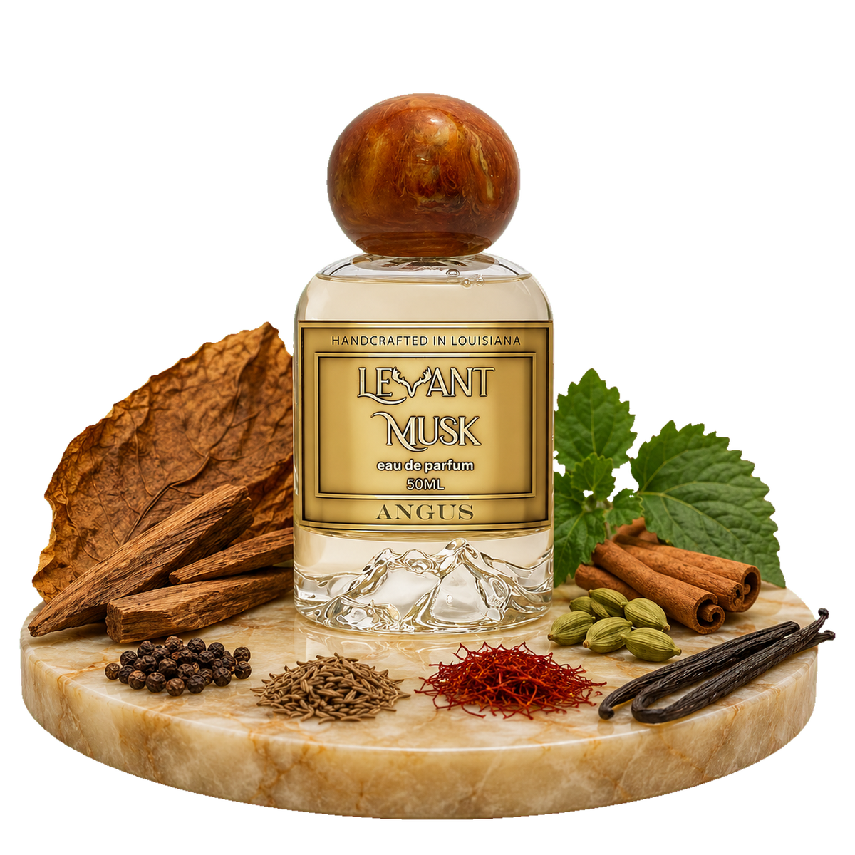 Angus by Levant Musk Eau de Parfum 50ml bottle with a wooden cap, displayed on a marble board surrounded by its scent ingredients including cinnamon, cardamom, vanilla, and tobacco.