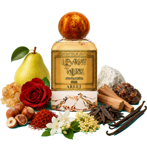 A bottle of Areej Levant Musk eau de perfum centered on a white background, surrounded by fragrance ingredients including a pear, rose, vanilla beans, saffron, flowers, wood chips, and crystals.