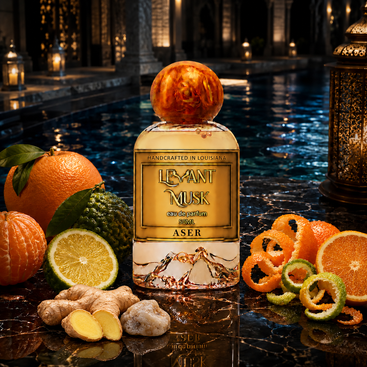 A 50 mL bottle of ASER by Levant Musk with mandarin, orange, bergamot, ginger, and ambergris beside a pool.