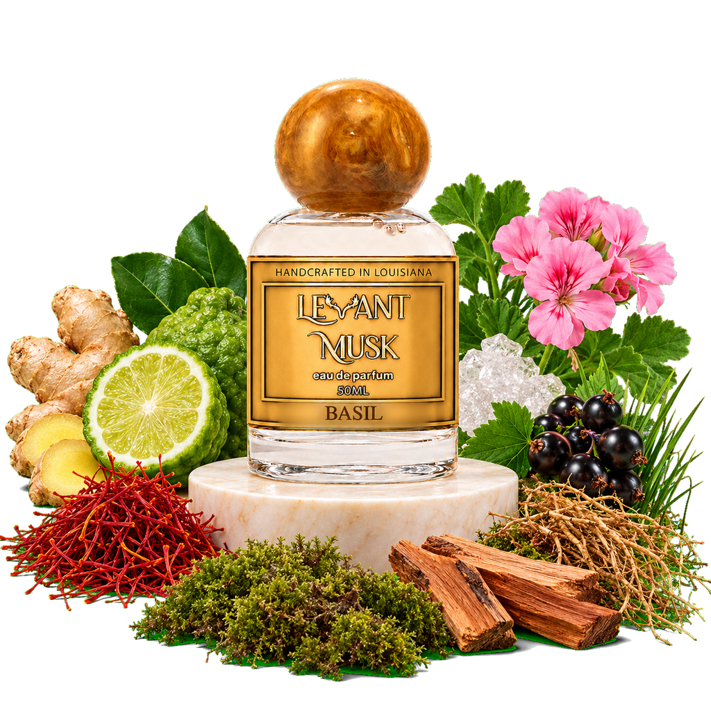 A perfume bottle labeled 'LEVANT MUSK' with a gold label and a round amber cap, displayed on a white pedestal and surrounded by botanical ingredients including basil leaves, ginger, lime, pink flowers, blackberries, moss, wood chips, and red threads on a white background.