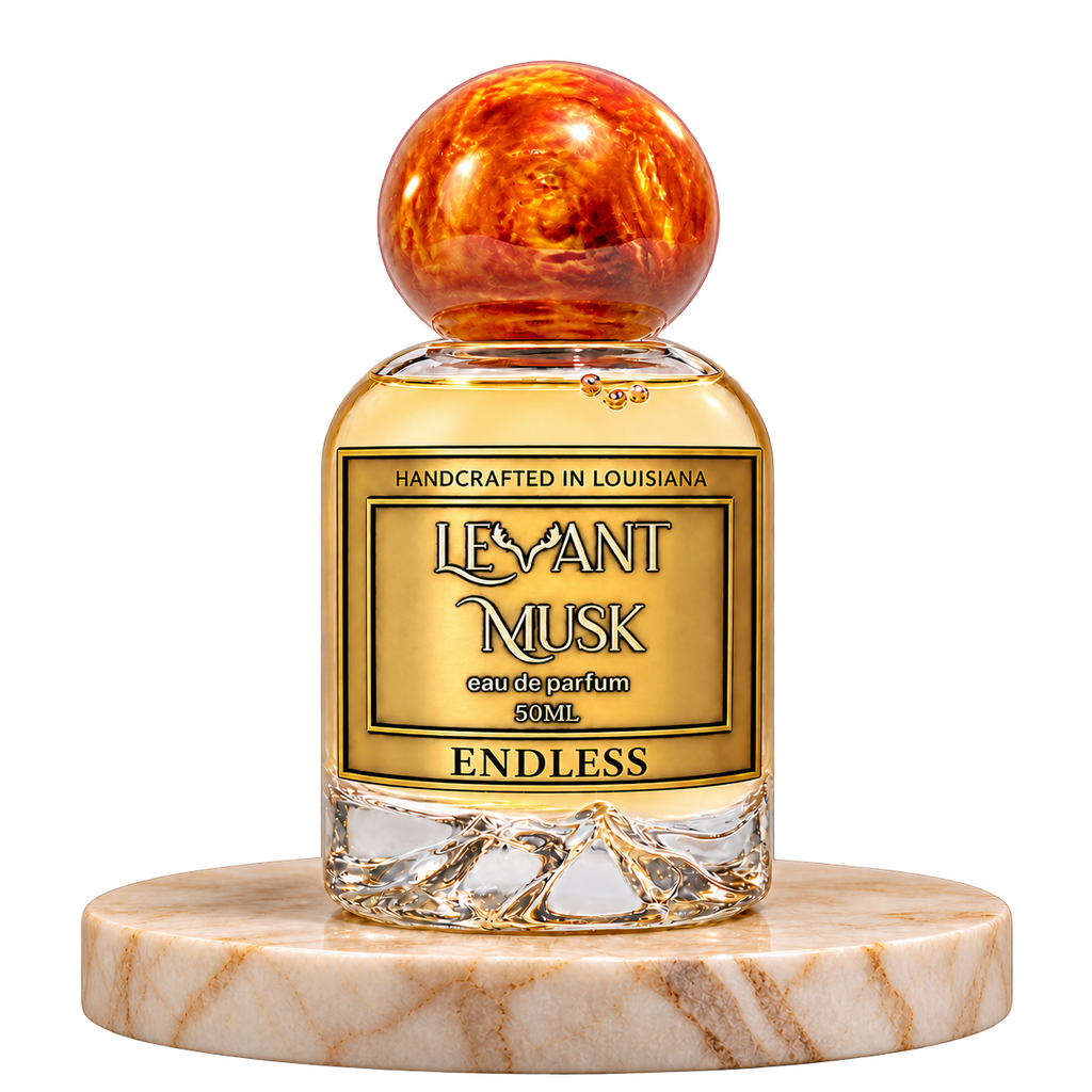 ENDLESS 50 mL orange-capped eau de parfum bottle on marble with a transparent background
