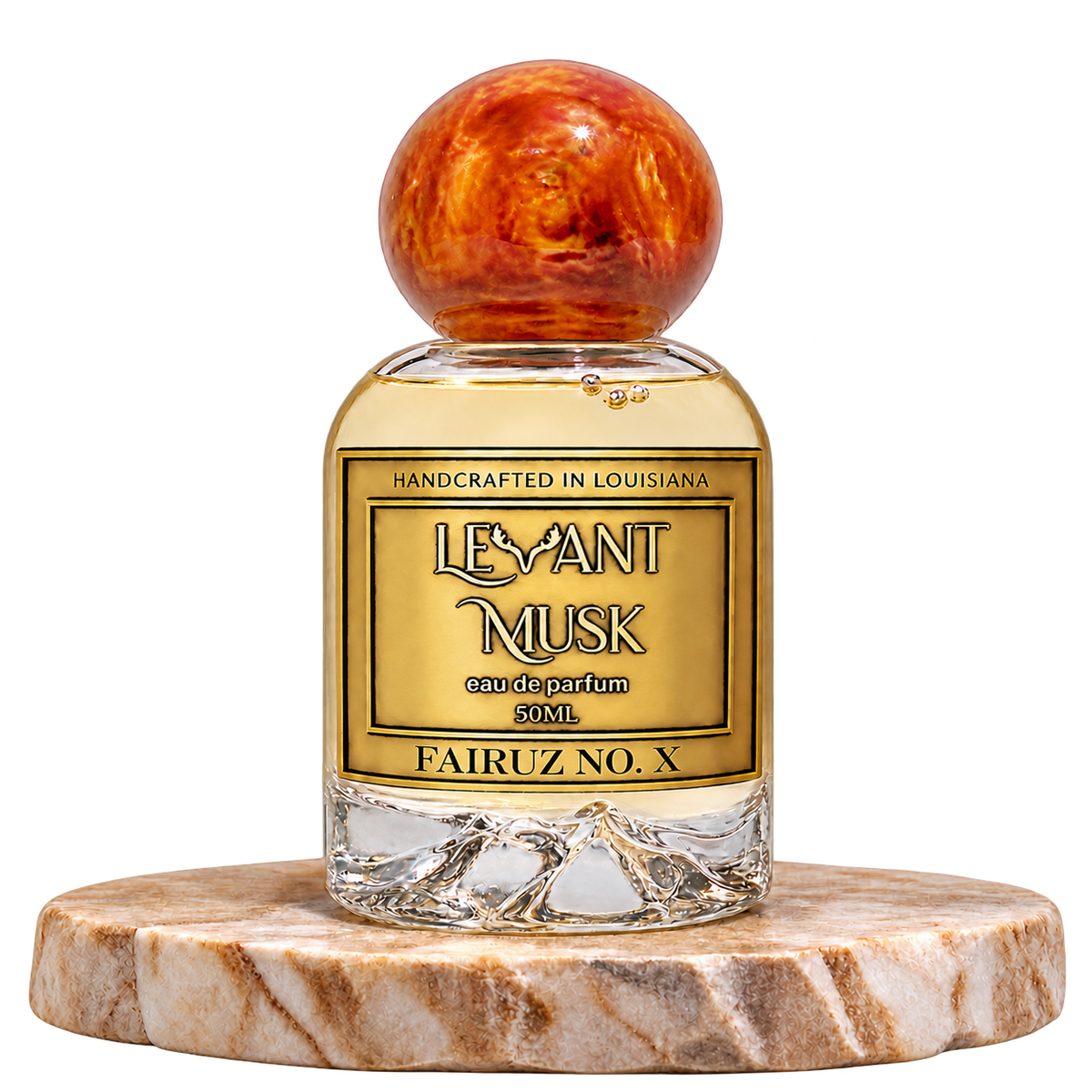 FAIRUZ NO. X 50 mL unisex eau de parfum in the Levant Musk gold-label bottle with orange-gold round cap on a marble plinth, transparent background