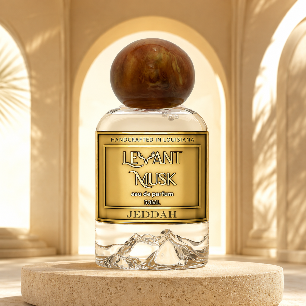 Levant Musk Jeddah perfume bottle styled with notes of chamomile, iris, and vanilla.
