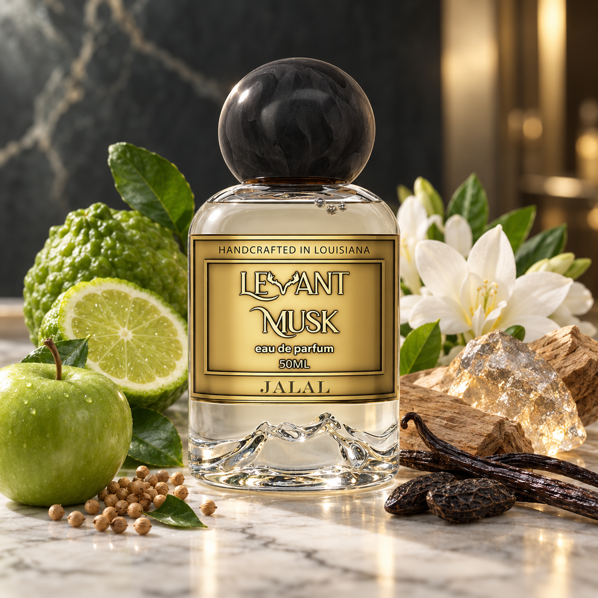 A 50ml bottle of Jalal Levant Musk Eau de Parfum, styled with its scent ingredients including a green apple, lime, bittersweet melon, white flowers, vanilla beans, and a crystal on a marble surface.