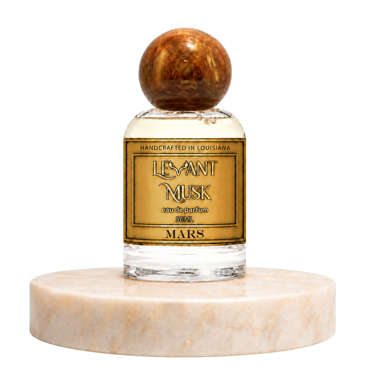 A 50ml bottle of Mars eau de parfum by Levant Musk handcrafted perfume, featuring a round amber cap and a gold label, displayed on a round beige marble pedestal against a white background.
