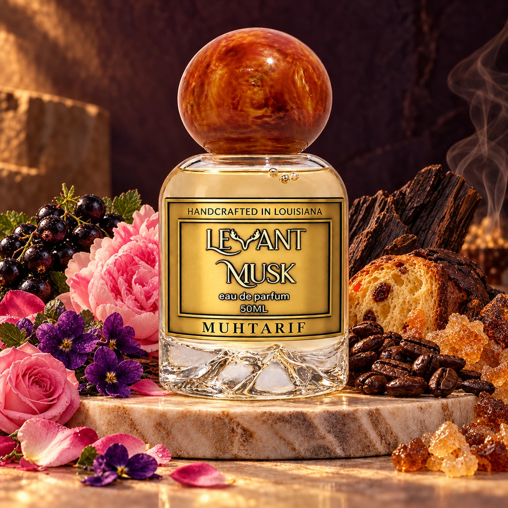 MUHTARIF by Levant Musk, with an orange-gold cap, rose, black currant, coffee, resins and dark wood
