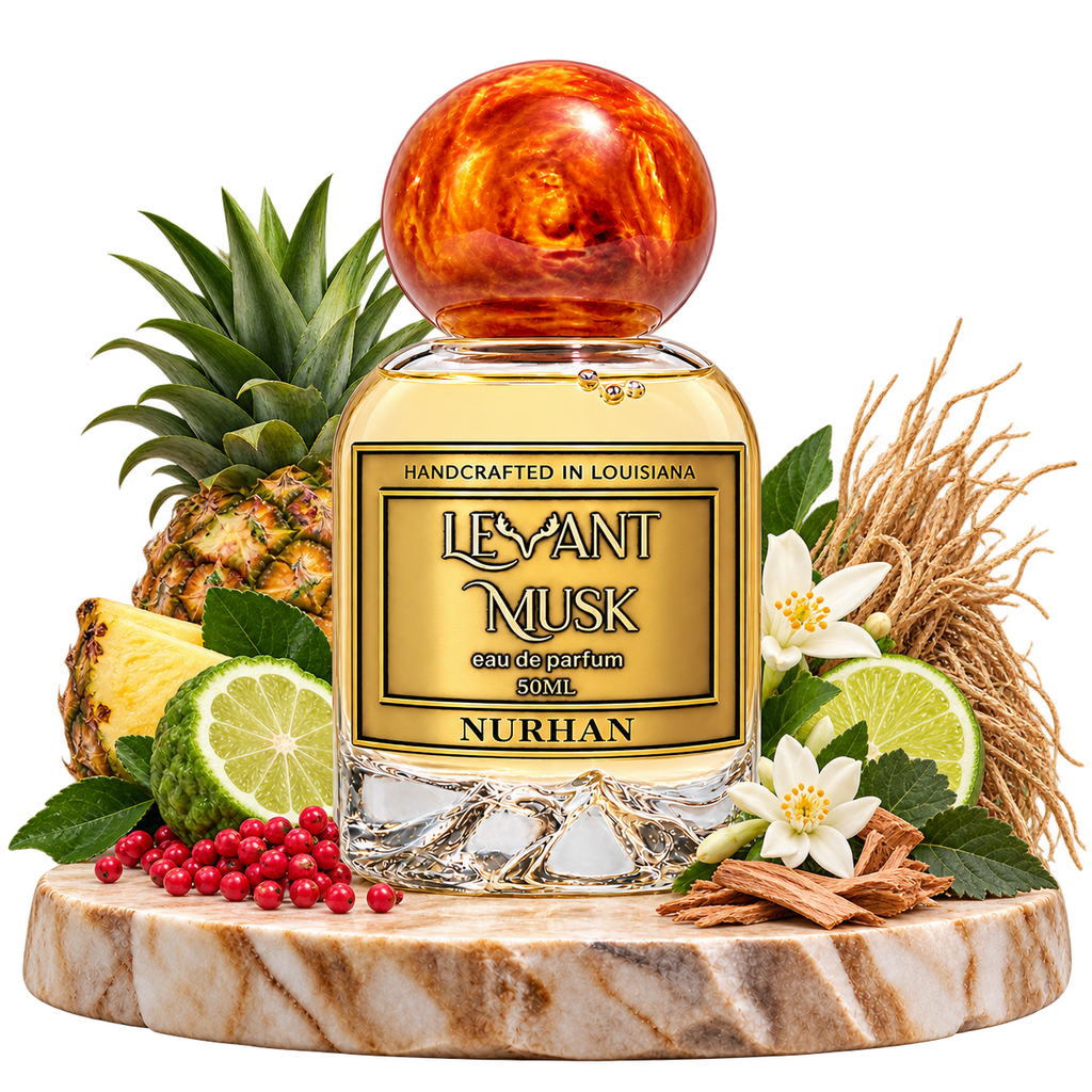 NURHAN bottle with orange marbled cap and corrected fragrance-note ingredients, including pineapple, bergamot, pink pepper, lime, white blossoms, cedarwood, patchouli and Haitian vetiver, on a transparent background.