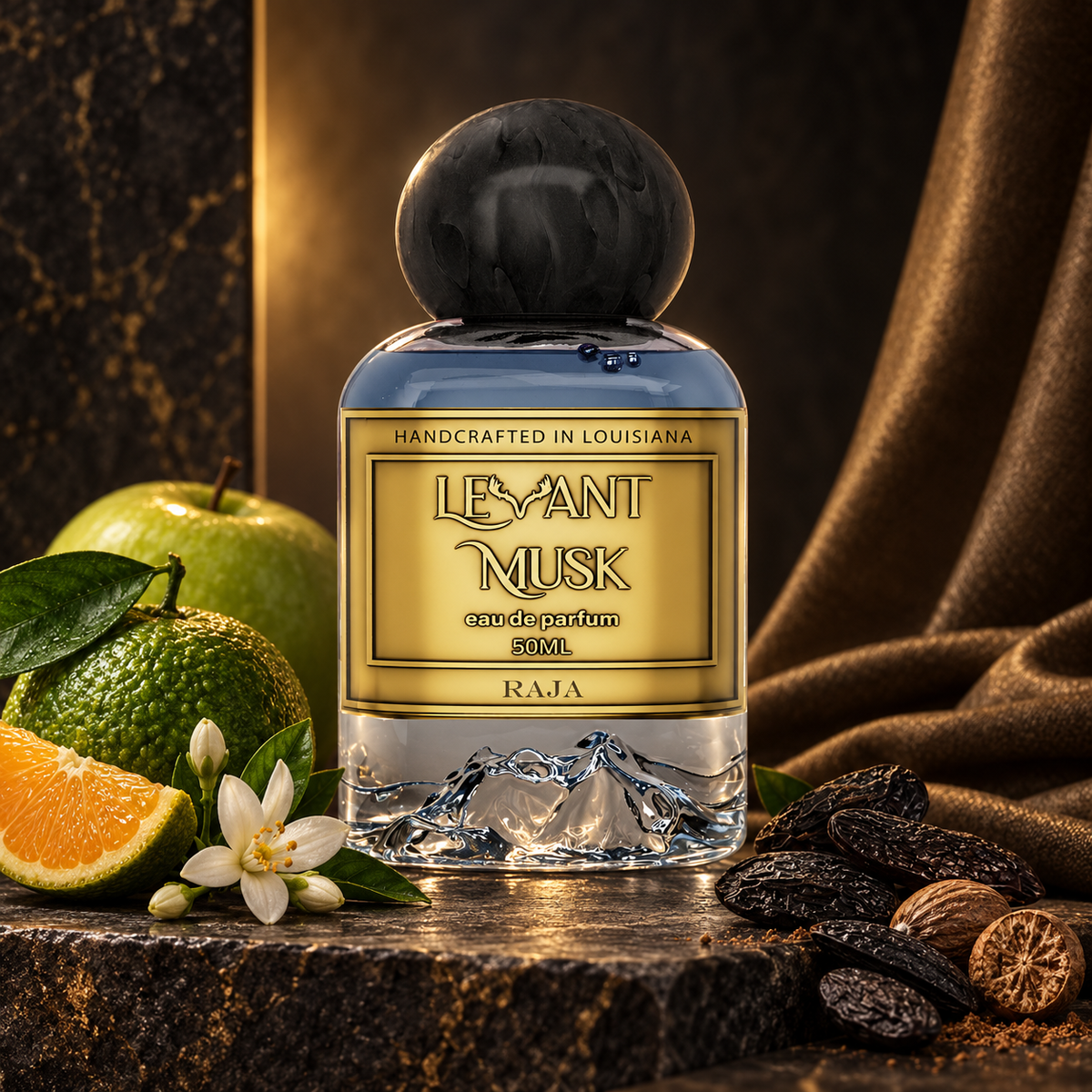 Levant Musk Raja perfume bottle styled with notes of green mandarin, orange blossom, and tonka bean.