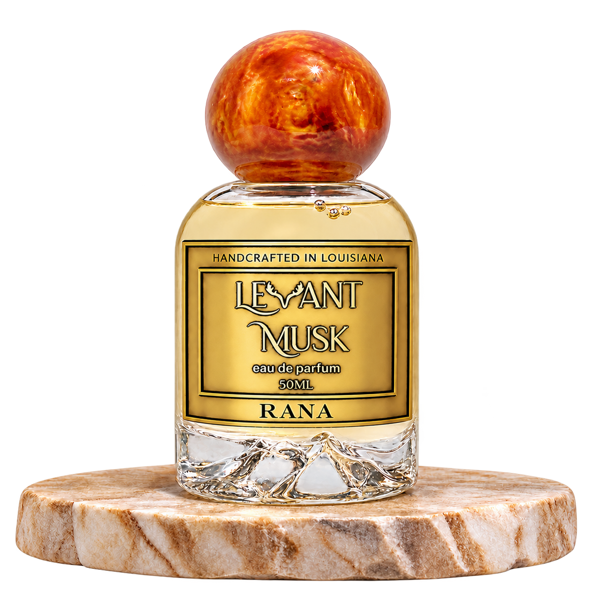 RANA by Levant Musk bottle alone on a beige marble platform with transparent background