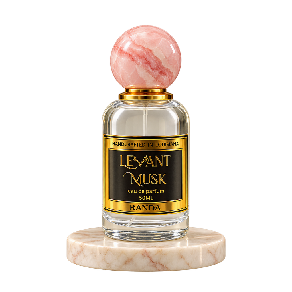 RANDA by Levant Musk with blush pink marble cap on cream marble pedestal