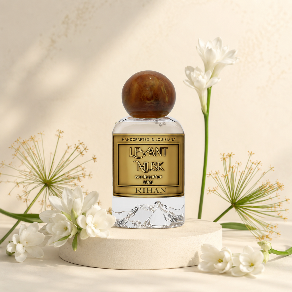  Levant Musk Rihan perfume bottle styled with notes of fresh green facets, papyrus, and dry smoky woods.