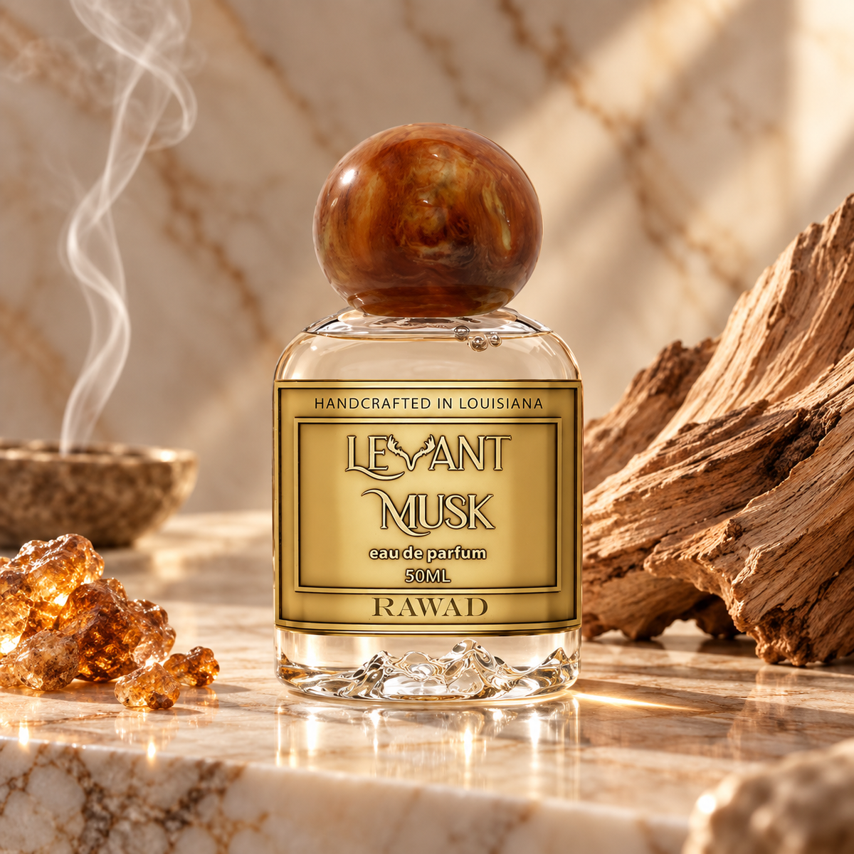 A 50ml bottle of RAWAD Levant Musk Eau de Parfum with a round brown cap, set on a marble surface with amber crystals, driftwood, and a smoking incense burner in the background.