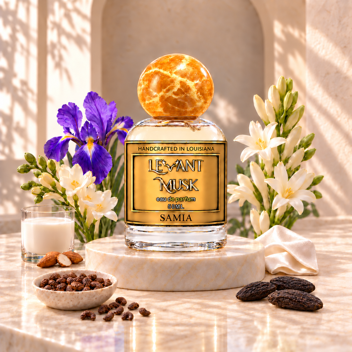 SAMIA by Levant Musk, orange-gold-cap 50 mL bottle in an atmospheric fragrance setting