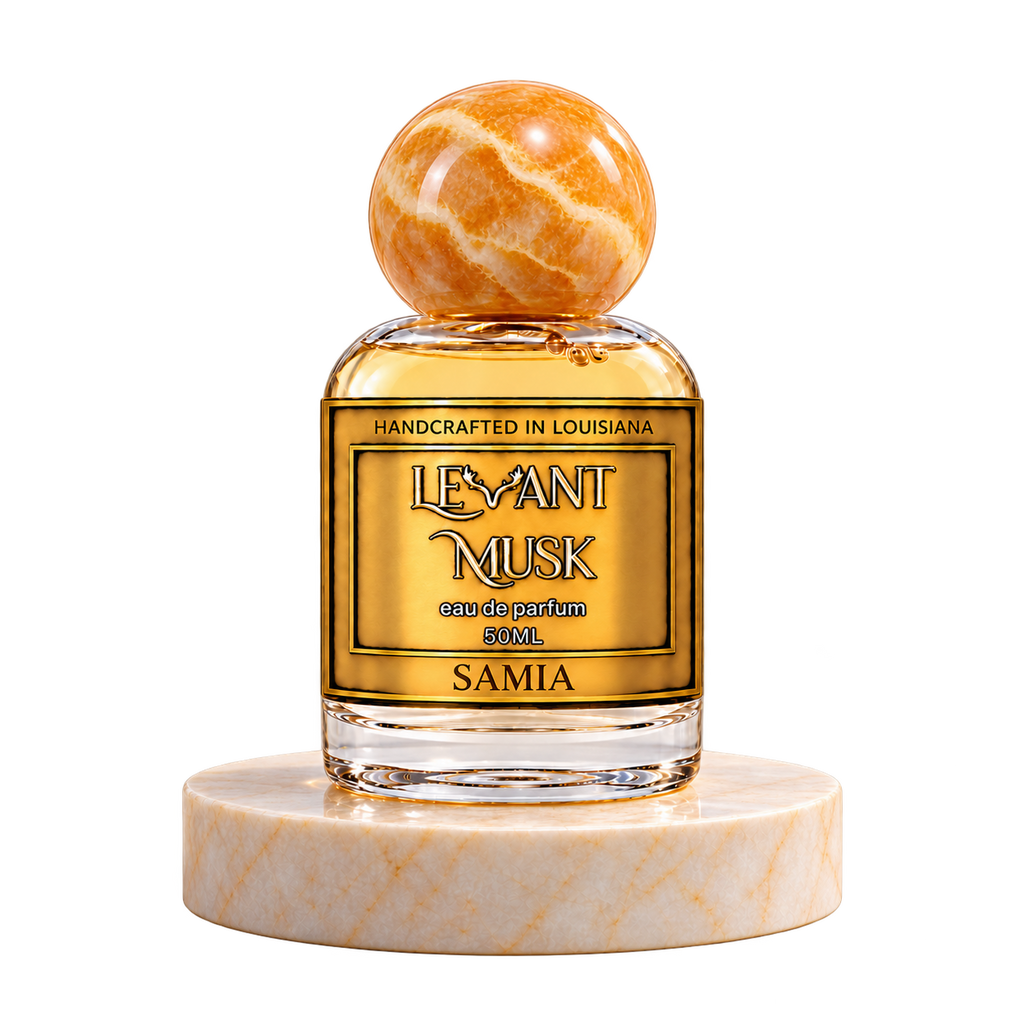 SAMIA 50 mL Levant Musk bottle with orange-gold cap on marble with transparent outer background