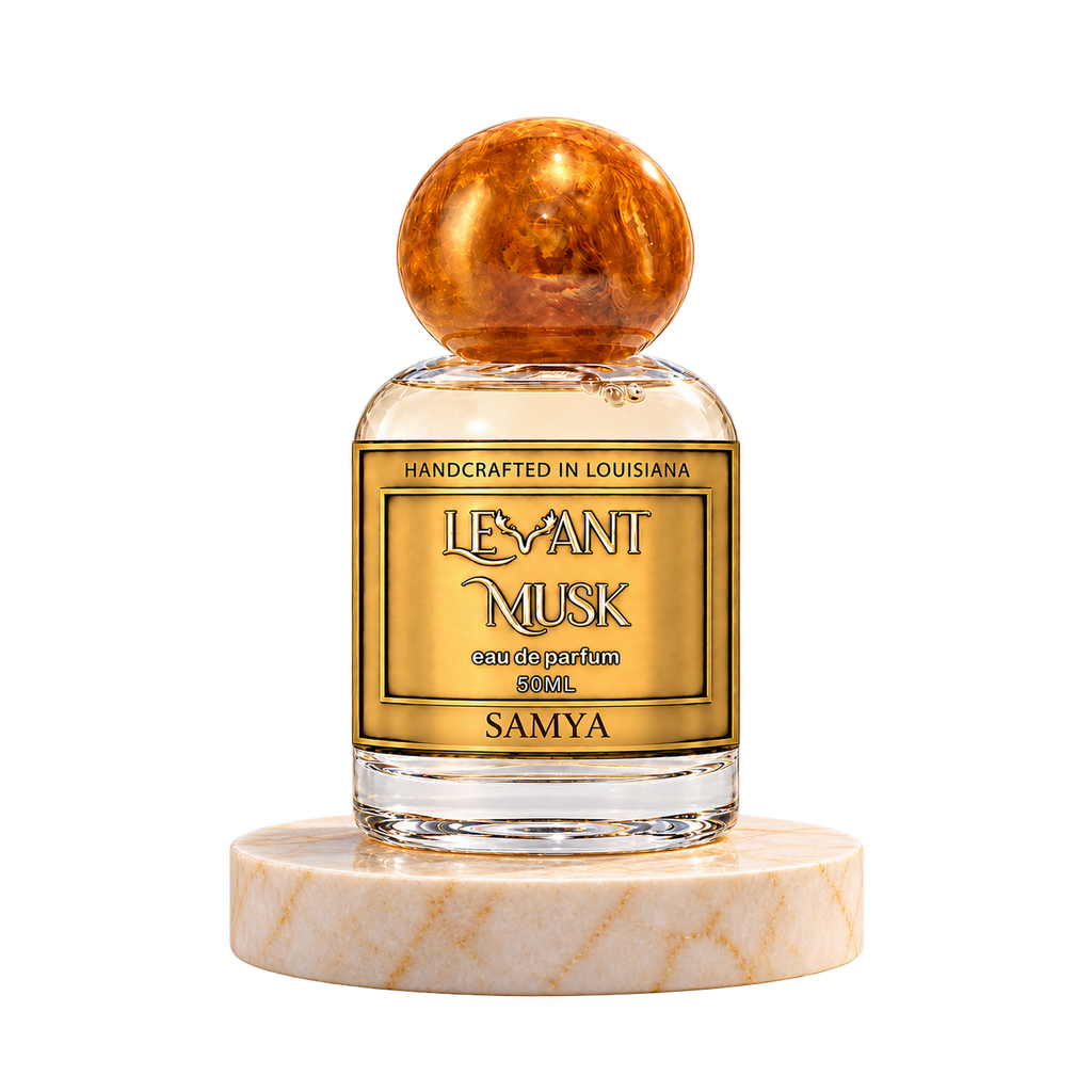 SAMYA 50 mL Levant Musk bottle with orange-gold cap on marble with transparent outer background