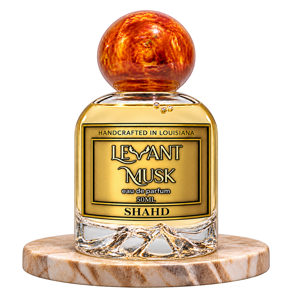 SHAHD by Levant Musk bottle alone on a beige marble platform with transparent background
