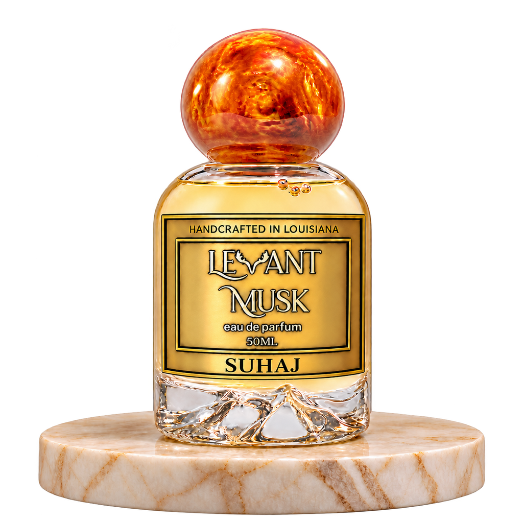 SUHAJ 50 mL Eau de Parfum bottle on a marble pedestal
