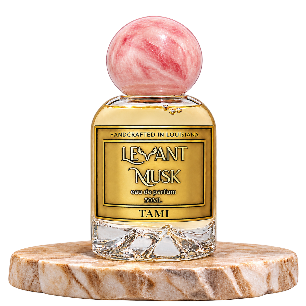 TAMI 50 mL Levant Musk bottle with pink cap on marble with transparent outer background