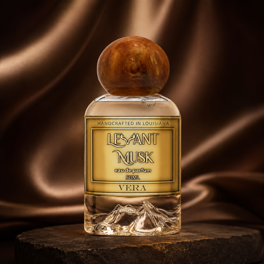 Levant Musk Vera perfume bottle styled with notes of safraleine, coffee absolute, and mahogany wood.