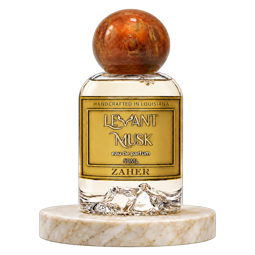 ZAHER 50 mL Eau de Parfum by Levant Musk with an amber spherical cap on a marble pedestal, on a transparent background.