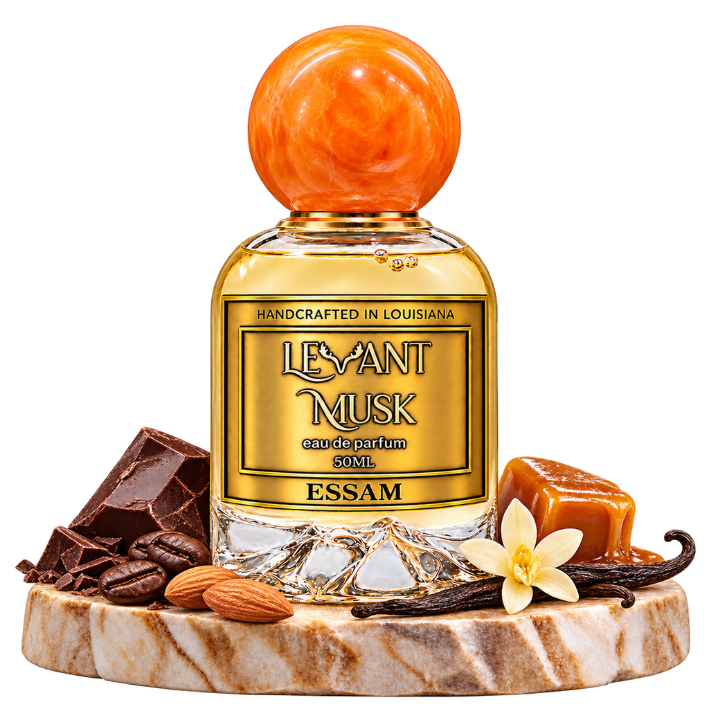 ESSAM by Levant Musk, bottle with fragrance-note props on a marble pedestal