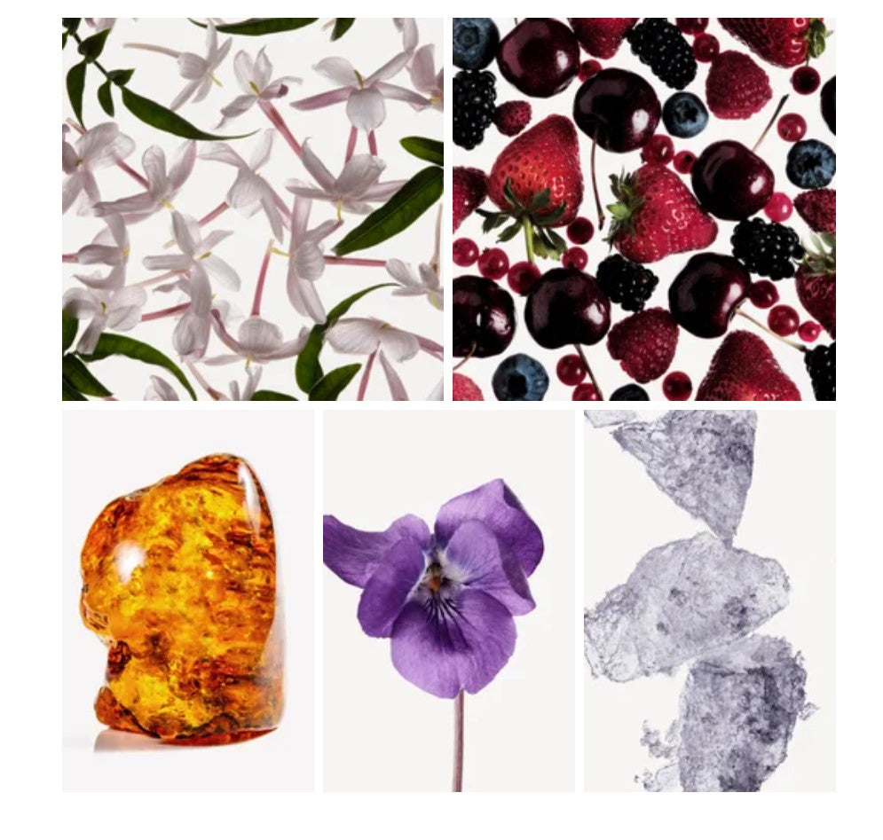 Huda fragrance styled with notes of strawberry, violet, and musk