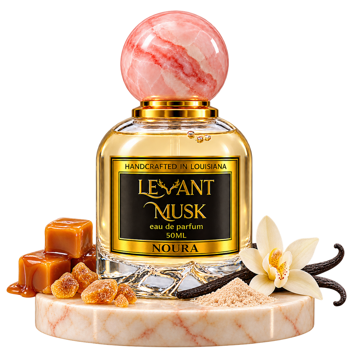 NOURA by Levant Musk, bottle with fragrance-note props on a marble pedestal