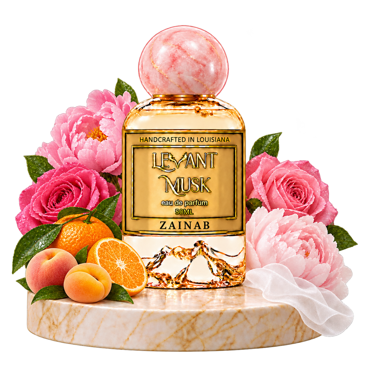 ZAINAB by Levant Musk on a marble pedestal with Sicilian Mandarin, Pink Peony, Damask Rose, Apricot, Peach and white fabric, on a transparent background.